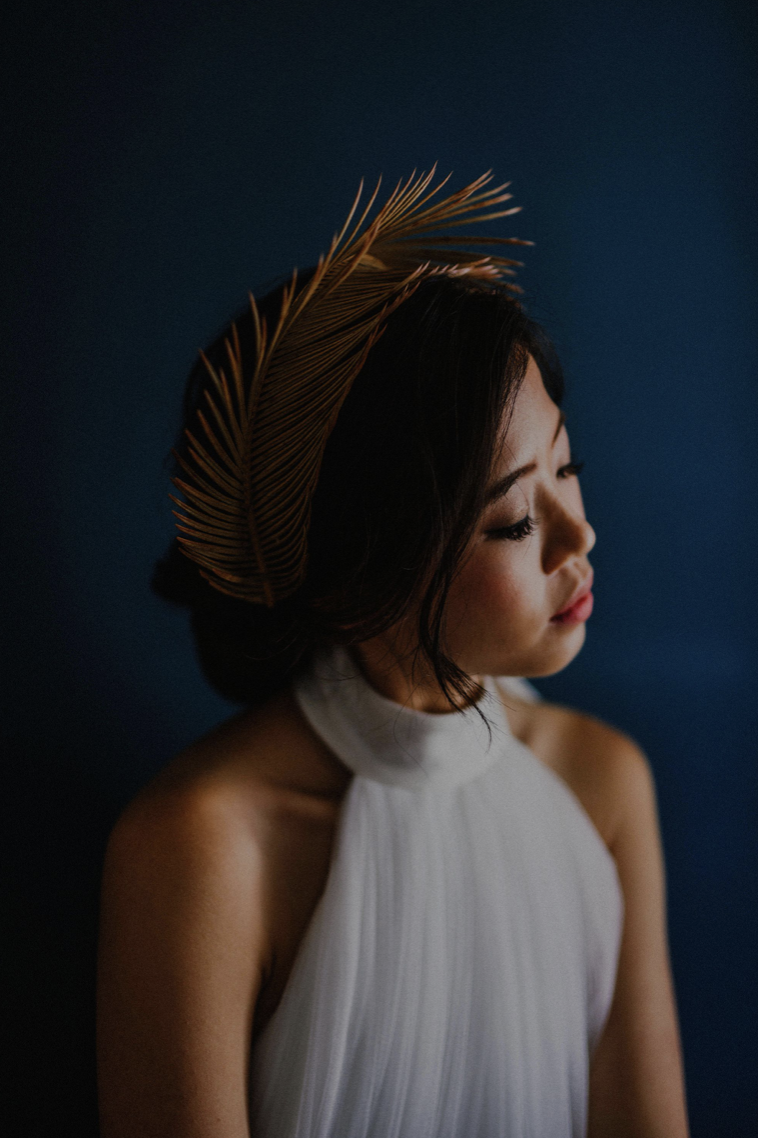 Ophelia — side profile with the golden palm headpiece