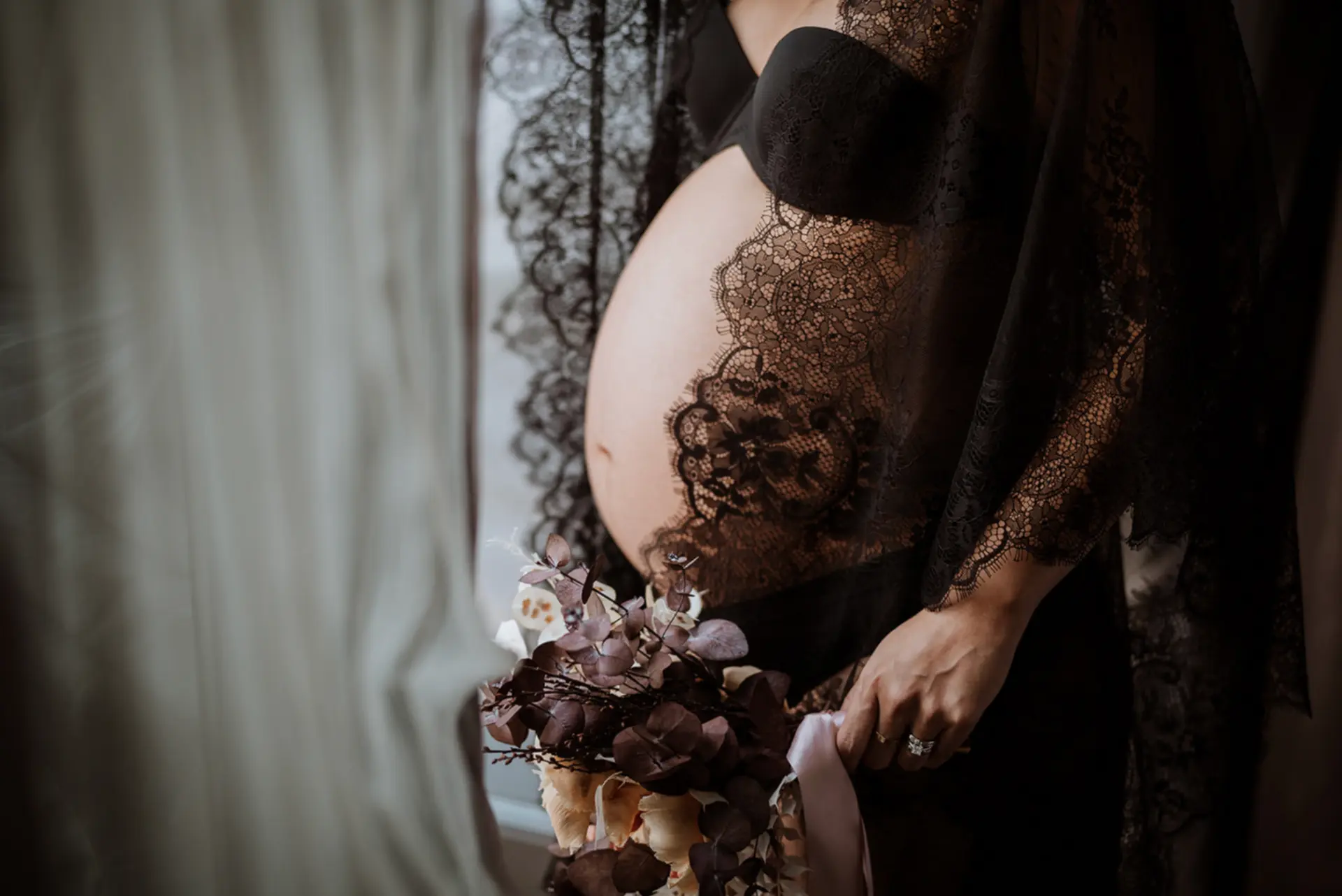 Phillane — profile in black lace with dried florals